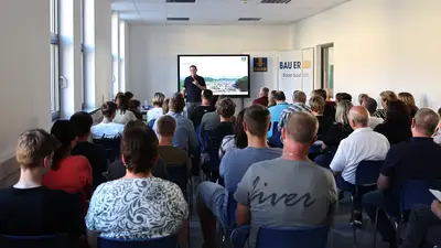 Training Manager Gerhard Piske answered questions and provided information about the new apprenticeship program in surveying technology.